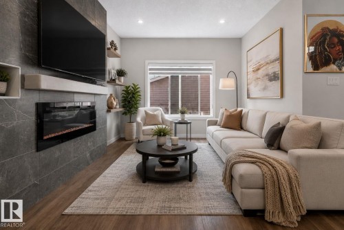 262 Rolston Wynd, Leduc, AB - Indoor Photo Showing Living Room With Fireplace