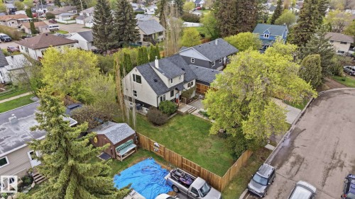 Two-story residence featuring a gabled roof and light-colored siding - 4 Langley Dr, Fort Saskatchewan, AB - Outdoor With View