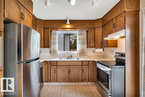 17524 57 Avenue, Edmonton, AB - Indoor Photo Showing Kitchen With Stainless Steel Kitchen With Double Sink