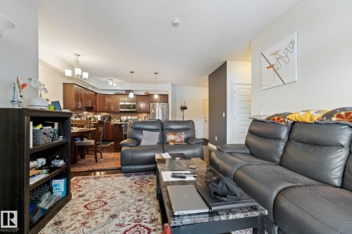 214 10530 56 Avenue, Edmonton, AB - Indoor Photo Showing Living Room