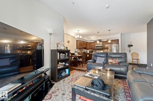 214 10530 56 Avenue, Edmonton, AB - Indoor Photo Showing Living Room