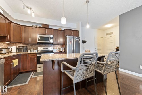214 10530 56 Avenue, Edmonton, AB - Indoor Photo Showing Kitchen With Upgraded Kitchen