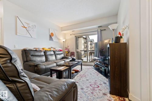 214 10530 56 Avenue, Edmonton, AB - Indoor Photo Showing Living Room
