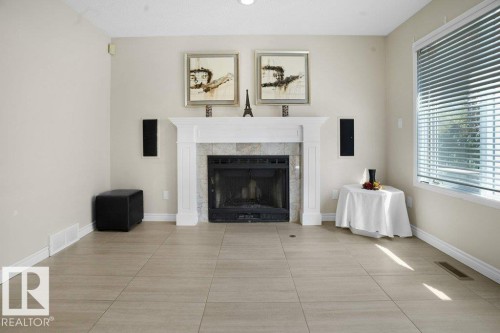 762 Wells Wynd, Edmonton, AB - Indoor Photo Showing Living Room With Fireplace