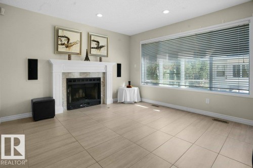 762 Wells Wynd, Edmonton, AB - Indoor Photo Showing Living Room With Fireplace