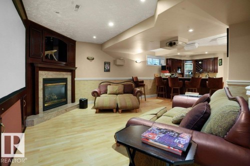 762 Wells Wynd, Edmonton, AB - Indoor Photo Showing Other Room With Fireplace