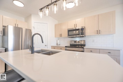 2928 25 Street, Edmonton, AB - Indoor Photo Showing Kitchen With Stainless Steel Kitchen With Double Sink With Upgraded Kitchen