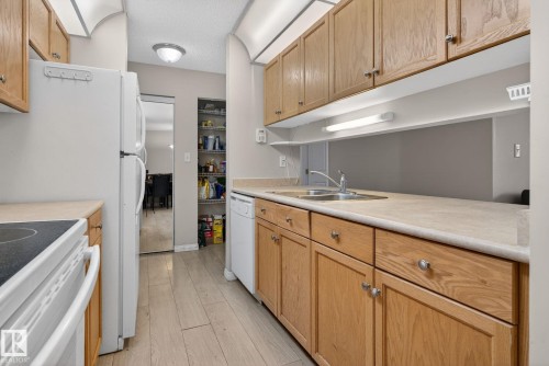 129 4210 139 Avenue, Edmonton, AB - Indoor Photo Showing Kitchen With Double Sink