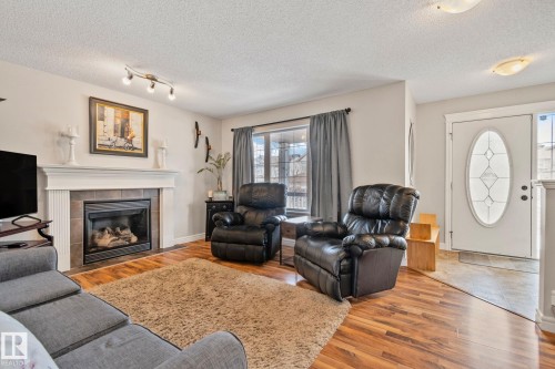 298 Suncrest Road, Sherwood Park, AB - Indoor Photo Showing Living Room With Fireplace