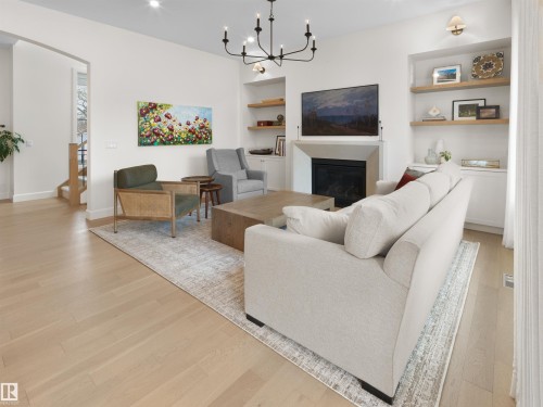 11234 73 Avenue, Edmonton, AB - Indoor Photo Showing Living Room With Fireplace