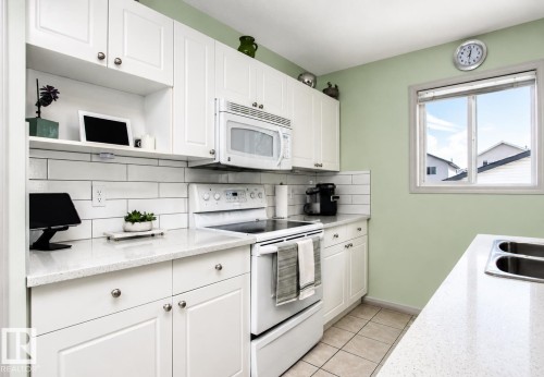 17311 90 Street, Edmonton, AB - Indoor Photo Showing Kitchen With Double Sink