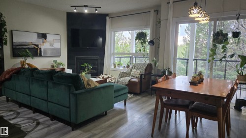 90 3010 33 Avenue, Edmonton, AB - Indoor Photo Showing Living Room With Fireplace