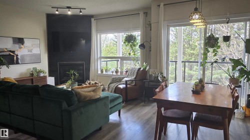 90 3010 33 Avenue, Edmonton, AB - Indoor Photo Showing Living Room With Fireplace