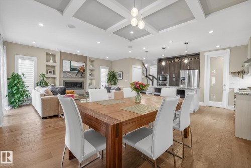 9648 83 Avenue, Edmonton, AB - Indoor Photo Showing Dining Room With Fireplace