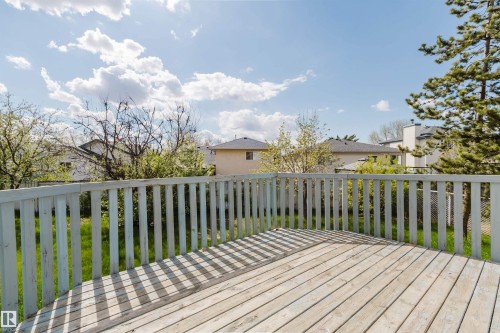 Spacious outdoor deck with light wood-finish decking and a matching railing - 13755 131B Avenue, Edmonton, AB - Outdoor With Deck Patio Veranda