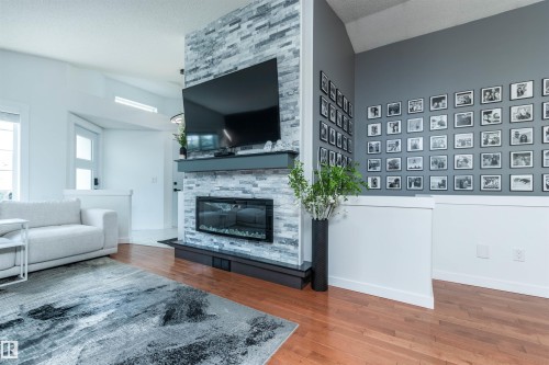 4012 53 Street, Beaumont, AB - Indoor Photo Showing Living Room With Fireplace