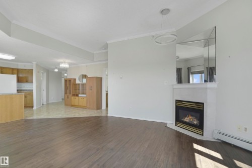 506 8315 83 Street, Edmonton, AB - Indoor Photo Showing Living Room With Fireplace