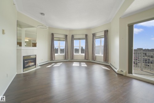 506 8315 83 Street, Edmonton, AB - Indoor Photo Showing Living Room With Fireplace