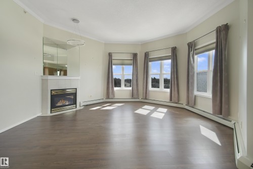 506 8315 83 Street, Edmonton, AB - Indoor Photo Showing Living Room With Fireplace