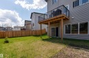A walkout basement makes the space feel less like a basement and more like an extension of the home. - 5323 Lark Landing Landing, Edmonton, AB  - Outdoor With Balcony 