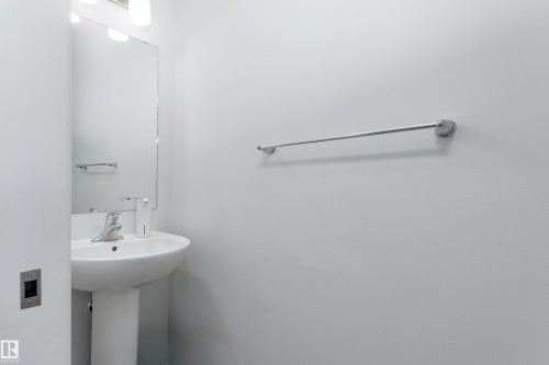 Half bath on main floor - 5323 Lark Landing Landing, Edmonton, AB - Indoor Photo Showing Bathroom