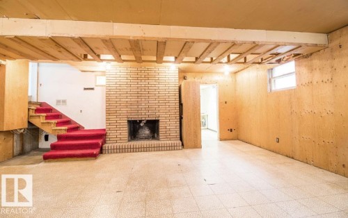 10328 42 Street, Edmonton, AB - Indoor Photo Showing Basement With Fireplace