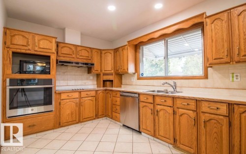 10328 42 Street, Edmonton, AB - Indoor Photo Showing Kitchen With Double Sink