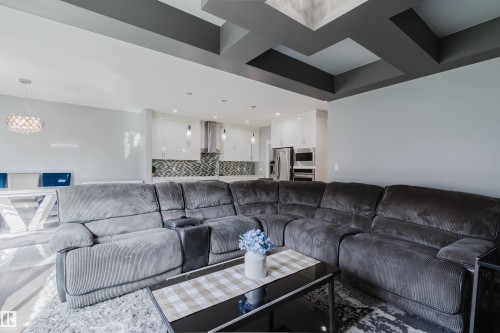 Open-concept living space with a multi-level coffered ceiling - 17030 62 Street, Edmonton, AB - Indoor Photo Showing Living Room