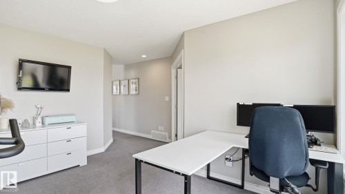 Versatile room with grey carpeting and light neutral walls - 2620 Adam Crest, Edmonton, AB - Indoor Photo Showing Office