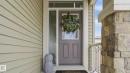 Entryway featuring a paneled door with glass inserts and a sidelight - 2620 Adam Crest, Edmonton, AB  - Outdoor With Exterior 