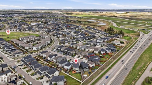 Aerial perspective of a residential neighborhood featuring a mix of detached homes and townhouses - 2620 Adam Crest, Edmonton, AB - Outdoor With View