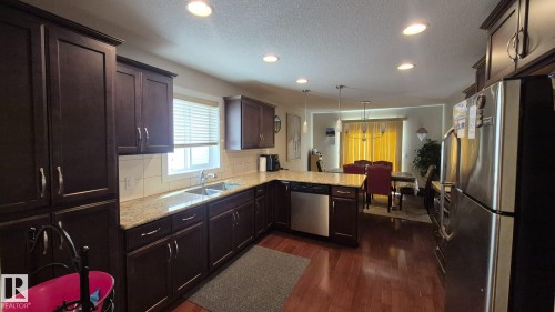 2044 33B Street Nw, Edmonton, AB - Indoor Photo Showing Kitchen With Double Sink