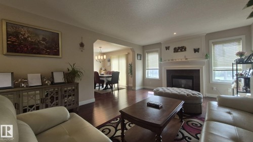2044 33B Street Nw, Edmonton, AB - Indoor Photo Showing Living Room With Fireplace