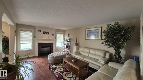 2044 33B Street Nw, Edmonton, AB - Indoor Photo Showing Living Room With Fireplace