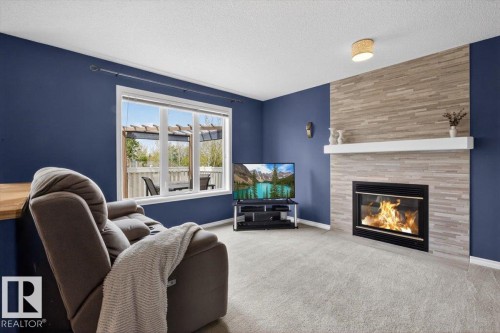 1358 118A Street, Edmonton, AB - Indoor Photo Showing Living Room With Fireplace