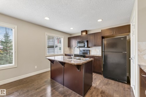 6 14621 121 Street, Edmonton, AB - Indoor Photo Showing Kitchen With Double Sink