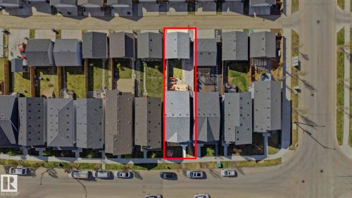 Aerial view highlighting a single-family residence with a gray shingle roof, a private backyard space, and proximity to street parking - 2116 159 Street, Edmonton, AB - 