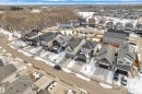Aerial view of a residential neighborhood with detached properties featuring paved driveways and attached garages - 21853 98A Avenue, Edmonton, AB  - Outdoor With View 