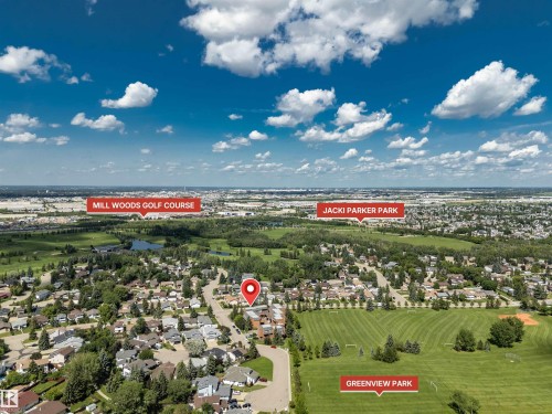 Aerial perspective showcasing the property's proximity to Mill Woods Golf Course, Jacki Parker Park, and Greenview Park - 5953 40 Avenue, Edmonton, AB 