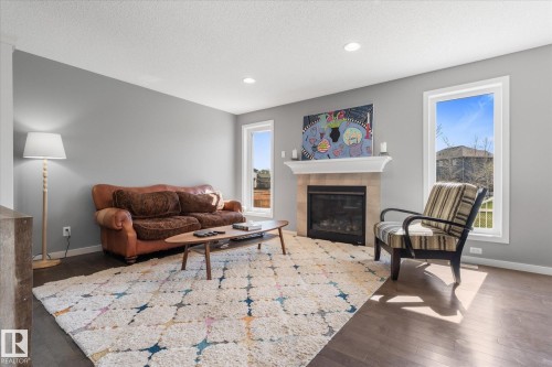 110 Aspenglen Drive, Spruce Grove, AB - Indoor Photo Showing Living Room With Fireplace