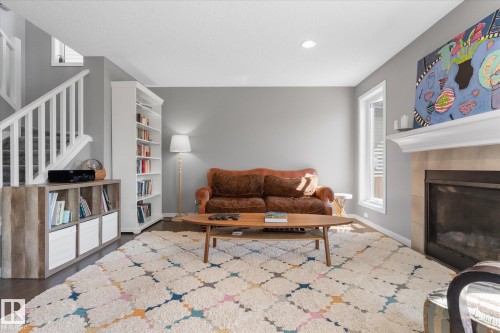110 Aspenglen Drive, Spruce Grove, AB - Indoor Photo Showing Living Room With Fireplace