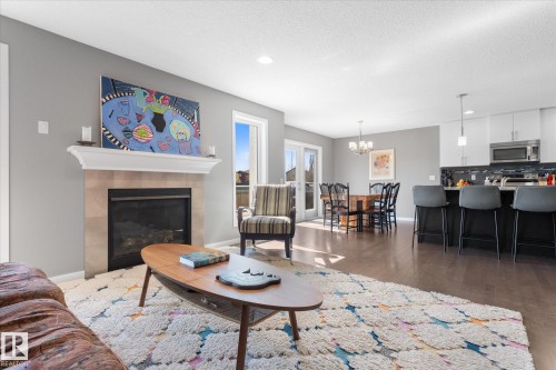 110 Aspenglen Drive, Spruce Grove, AB - Indoor Photo Showing Living Room With Fireplace
