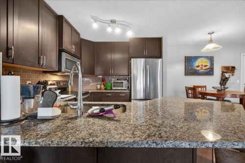 408 2204 44 Avenue, Edmonton, AB - Indoor Photo Showing Kitchen With Stainless Steel Kitchen With Double Sink With Upgraded Kitchen
