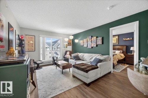 408 2204 44 Avenue, Edmonton, AB - Indoor Photo Showing Living Room
