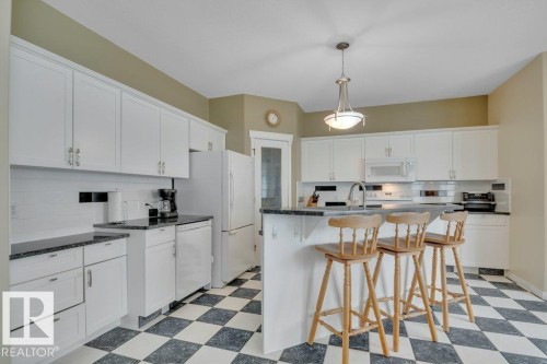 1957 Tomlinson Square Square, Edmonton, AB - Indoor Photo Showing Kitchen