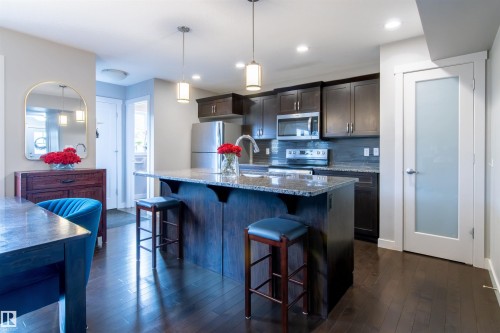 136 Cy Becker Boulevard, Edmonton, AB - Indoor Photo Showing Kitchen With Upgraded Kitchen