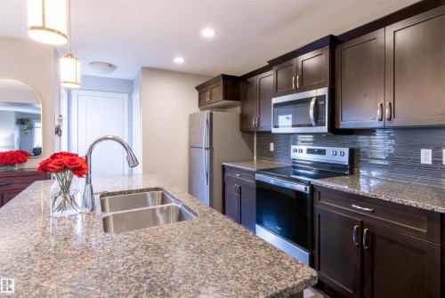 136 Cy Becker Boulevard, Edmonton, AB - Indoor Photo Showing Kitchen With Stainless Steel Kitchen With Double Sink