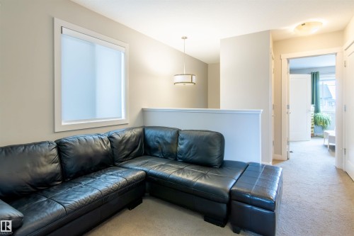 136 Cy Becker Boulevard, Edmonton, AB - Indoor Photo Showing Living Room