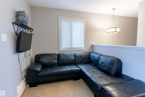 136 Cy Becker Boulevard, Edmonton, AB - Indoor Photo Showing Living Room
