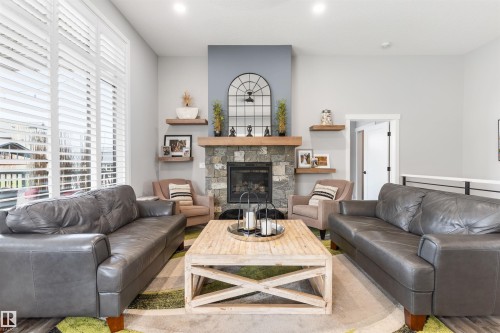 2011 Spring Drive, Rural Parkland County, AB - Indoor Photo Showing Living Room With Fireplace